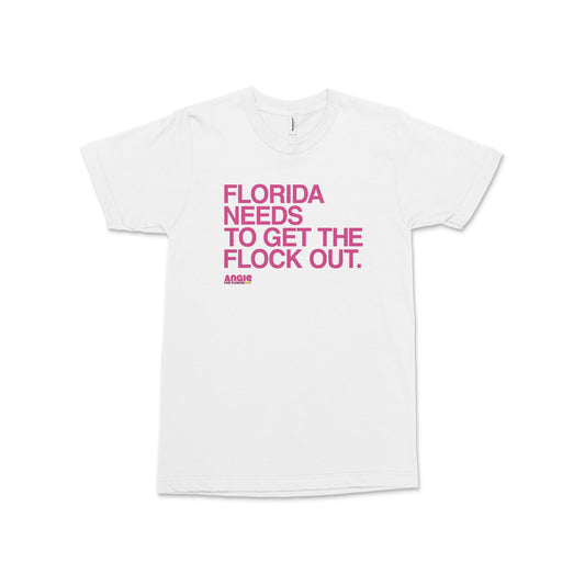 White cotton t-shirt with bold pink text "FLORIDA NEEDS TO GET THE FLOCK OUT." and smaller black "ANGIE NIXON" below.