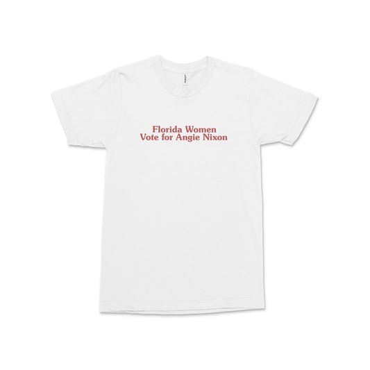 White cotton crew neck tee with red text reading "Florida Women Vote for Angie Nixon" centered on front.