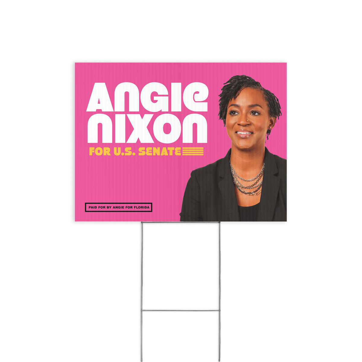 Pink rectangular yard sign with bold white text "ANGIE NIXON" and yellow text "FOR U.S.