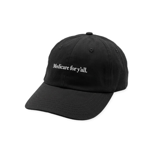 Black cotton baseball cap with white embroidered "Medicare for y’all." text on front.