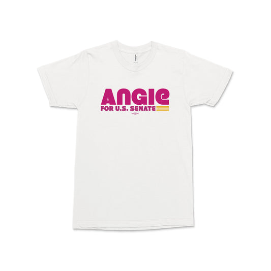 White short-sleeve cotton tee with purple and gold “ANGIE FOR U.S. SENATE” graphic centered on chest.