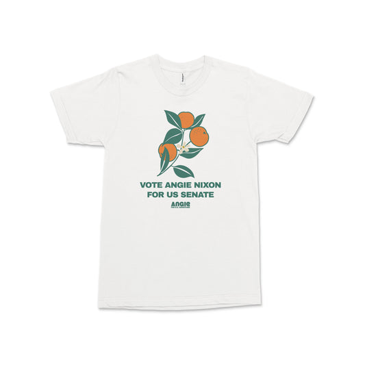 White short-sleeve cotton tee with green and orange graphic of oranges and text "Vote Angie Nixon For US Senate Amen" on.